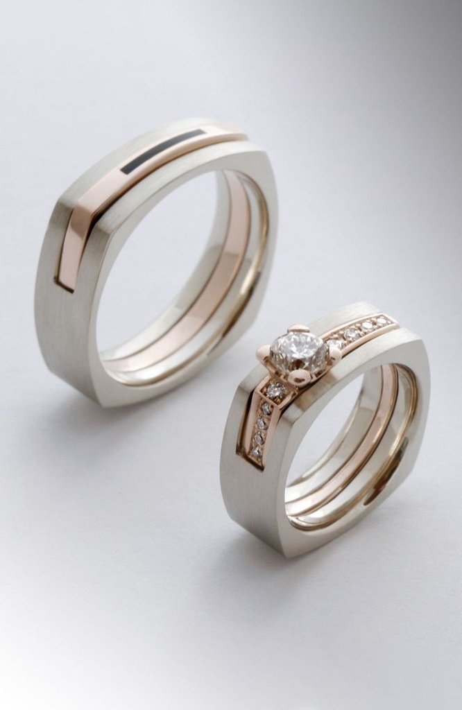 weight of couple rings together 6-7gms
melting 18kt
size of gents:-  23 no.
size of ladies:-  21 no.
