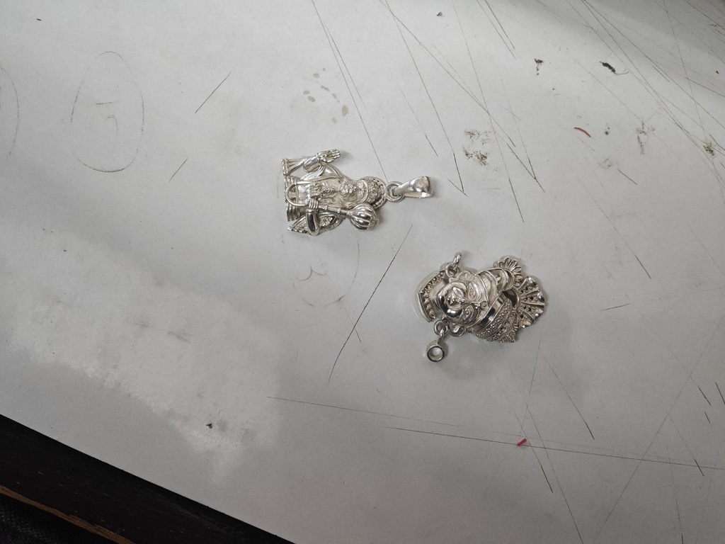 same to same design of swaminarayan bhagwan and hanumanji with same size 
melting 18kt yellow gold pendents
